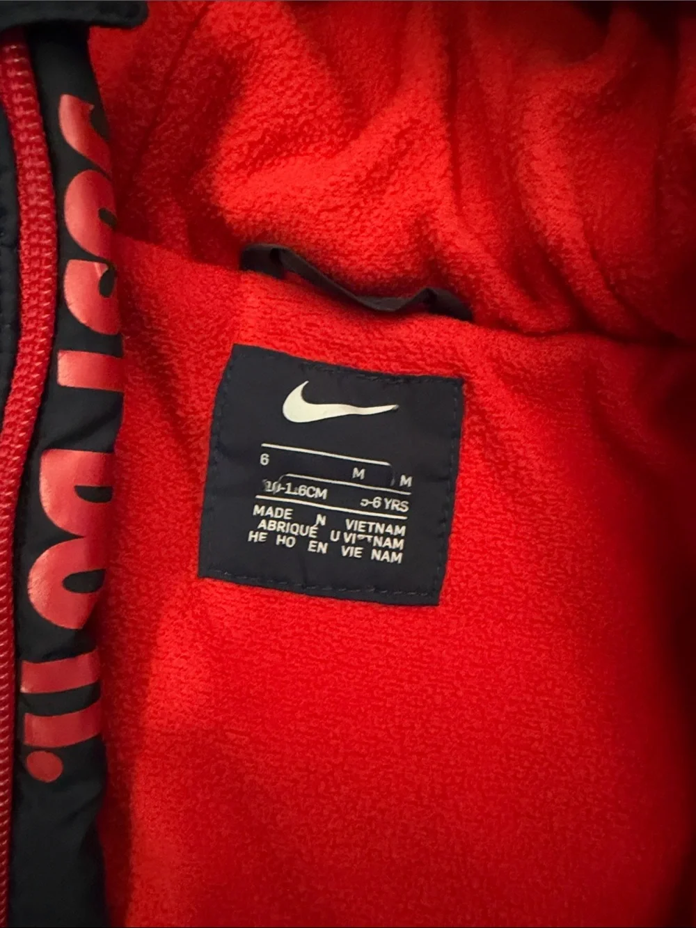 Nike Kids Navy Puffer Jacket with Red Accents